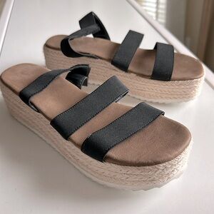 Platform sandals with elastic black straps